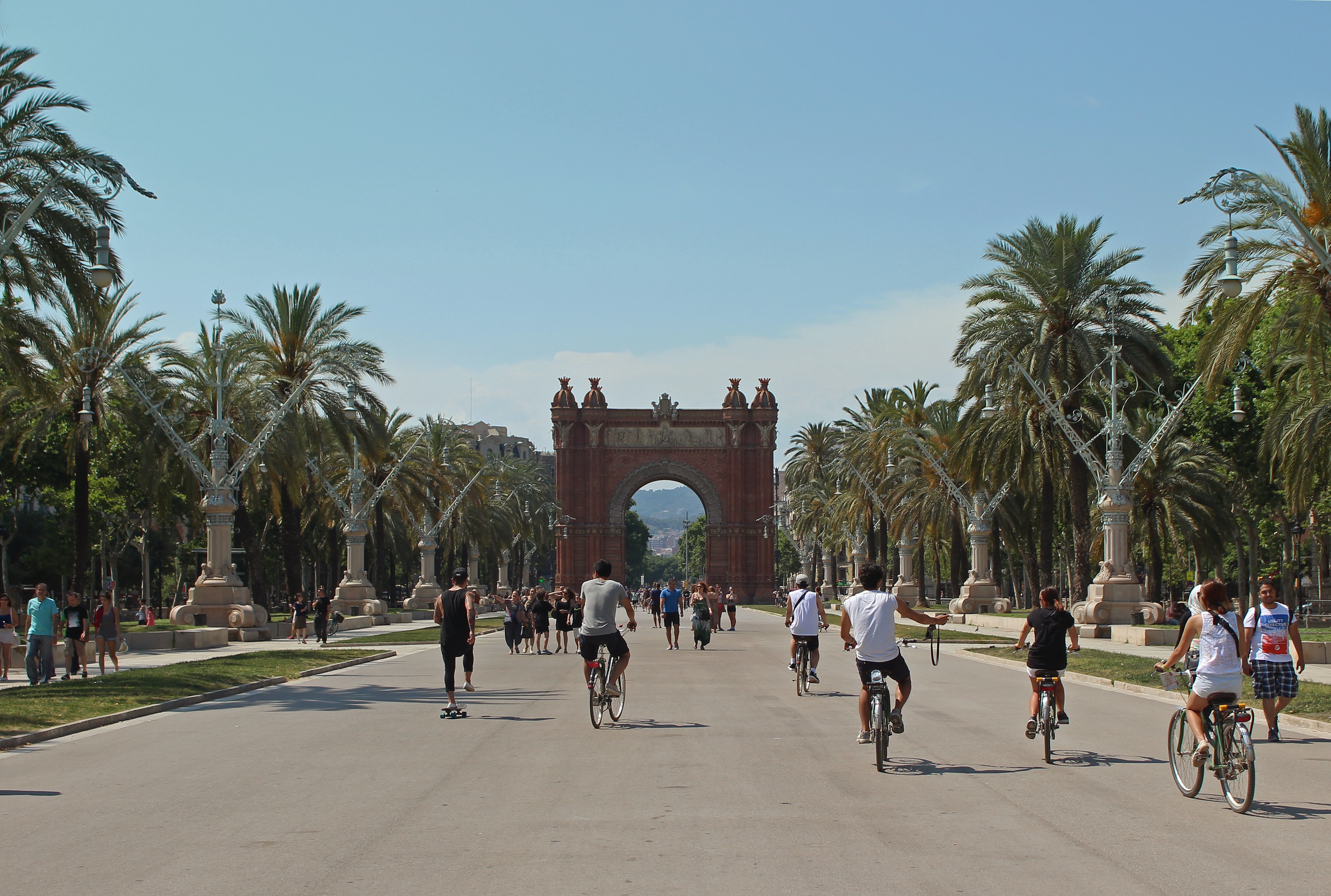 Cyclists and Arc de Triomf in Barcelona